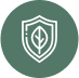 A green circular icon with a white outline of a shield containing a simple leaf design in the center, representing environmental protection or sustainability.