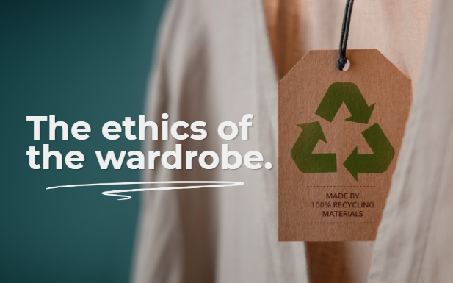 A garment with a “100% recycled material” label, representing sustainable fashion choices.